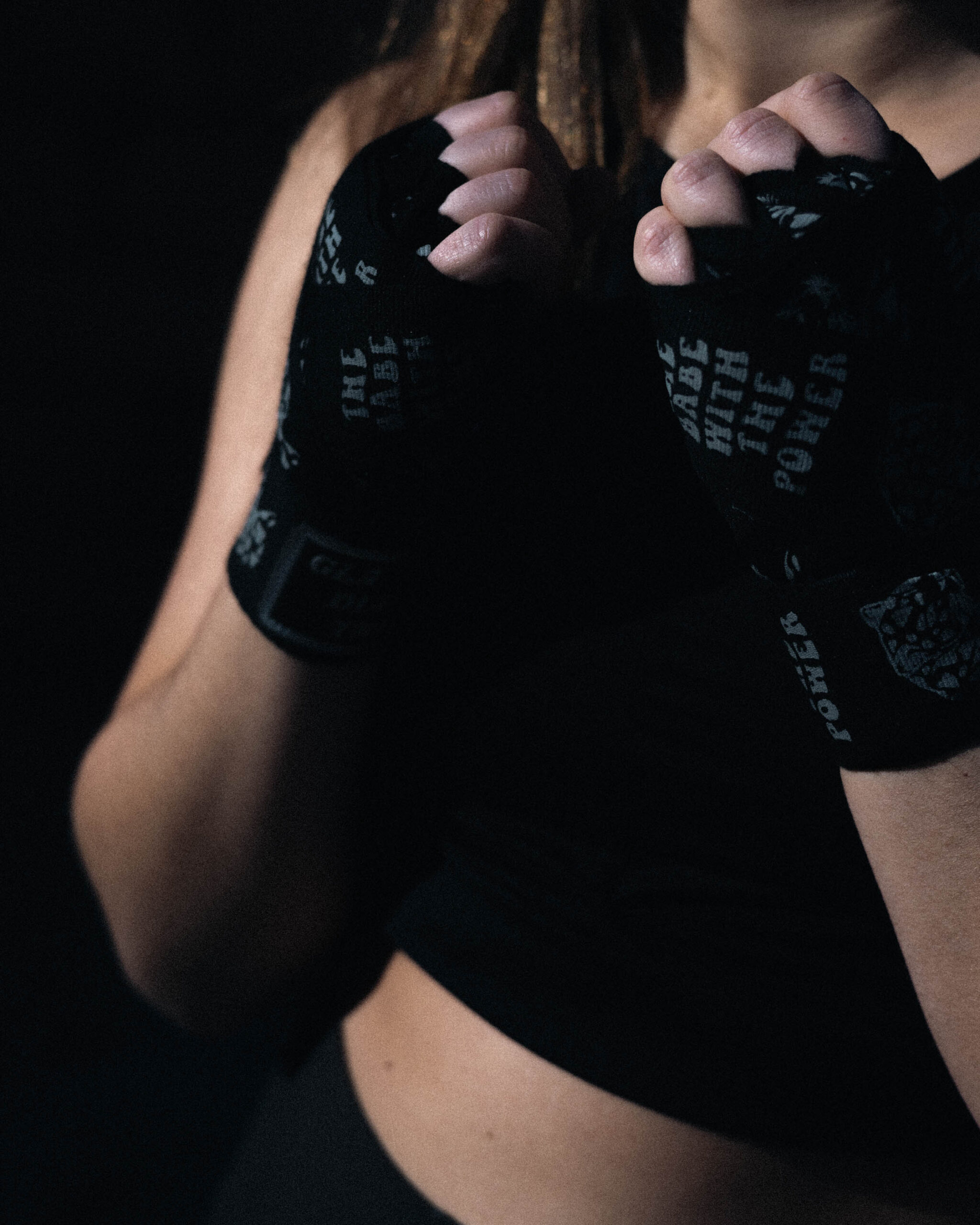 Female athlete in defensive boxing position